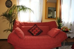 Sofa in the room of Venice Holiday Apartment
